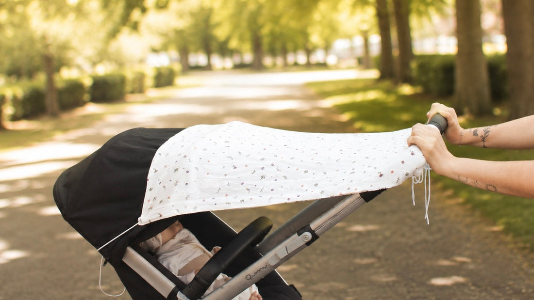 Comment savoir si bébé a trop chaud dans sa poussette ?