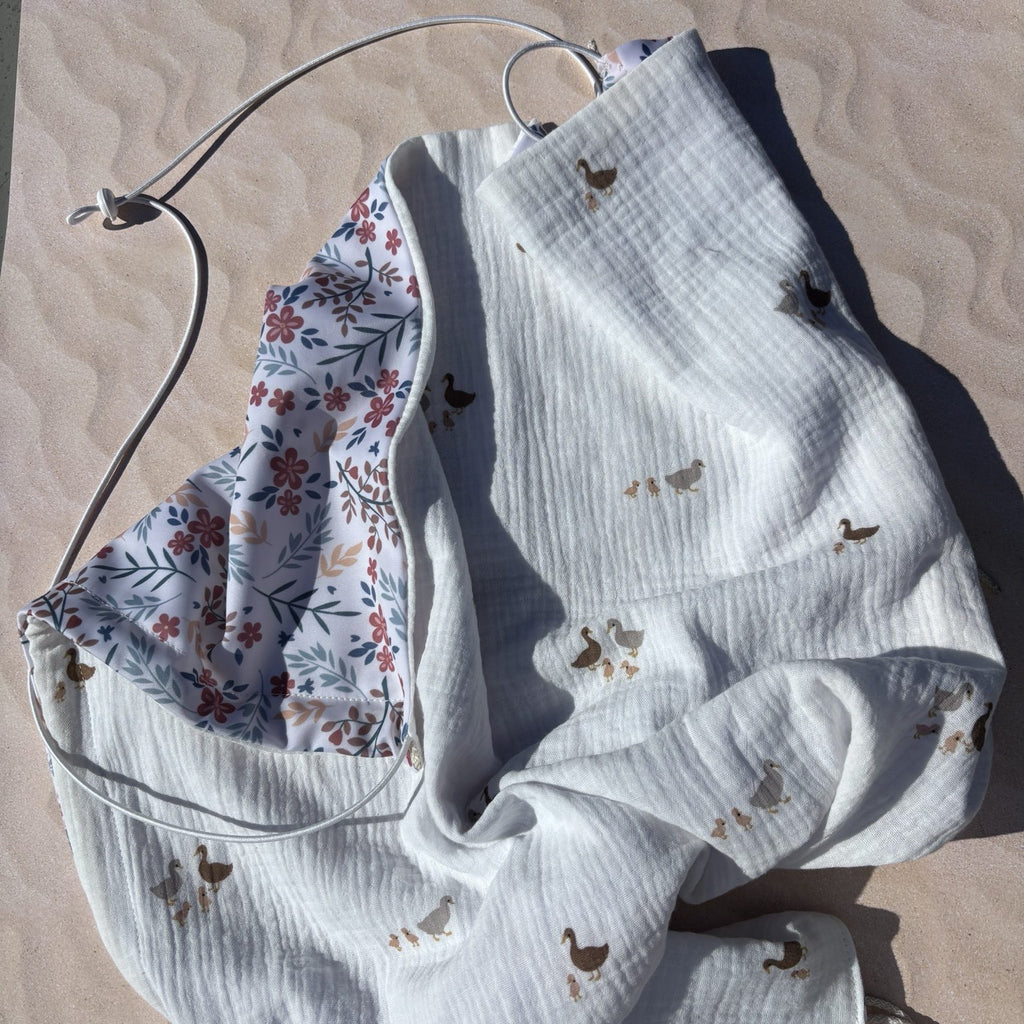 Pare-soleil réversible poussette motif fleurs et canards