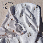 Pare-soleil poussette réversible motif lapins savane