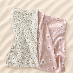 Pare-soleil pour poussette avec tissu anti-UV rose à motif marguerites et double gaze écrue à motif végétal vert sauge