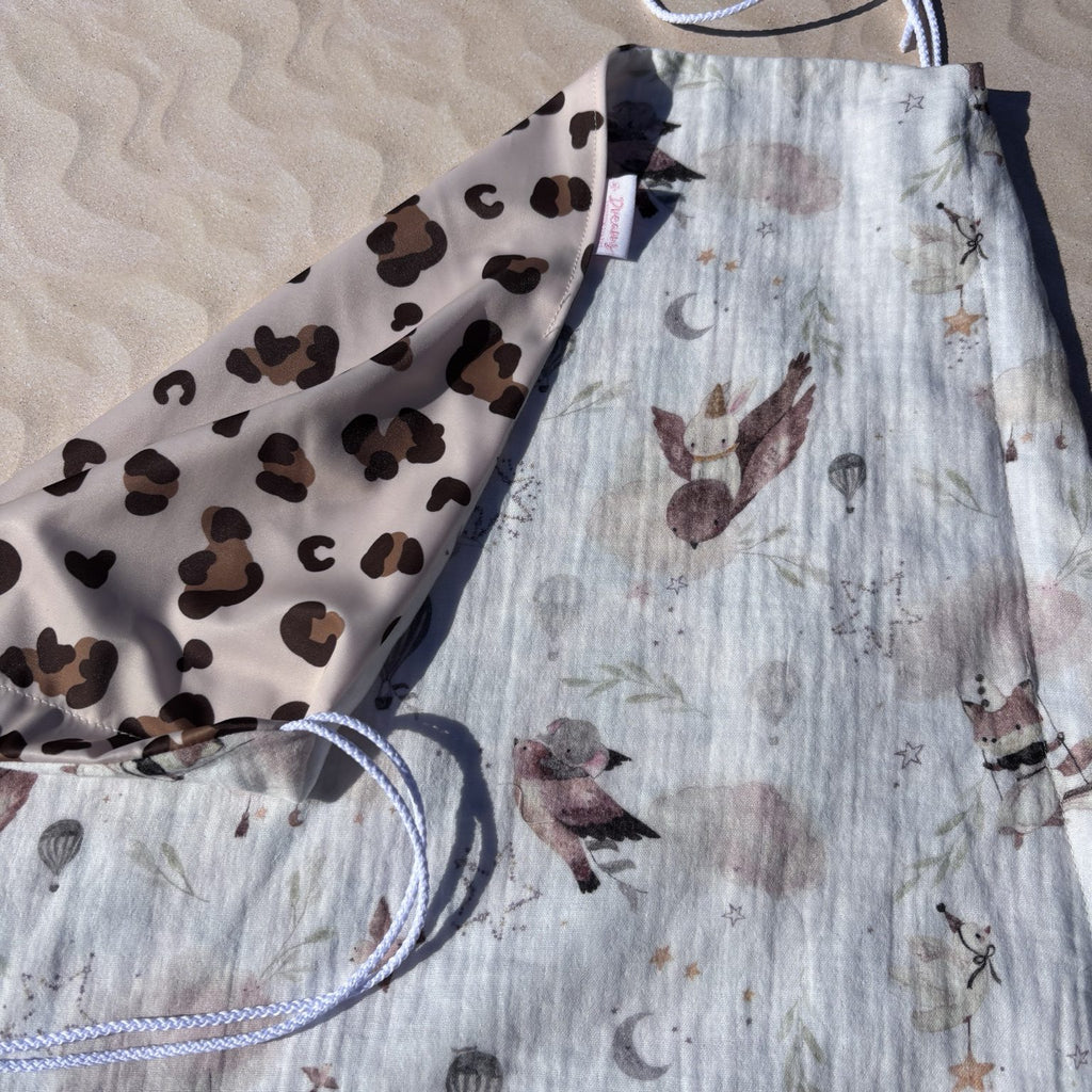 Pare-soleil poussette réversible motif léopard et oiseaux