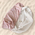 Pare-soleil pour poussette avec tissu anti-UV rose à motif marguerites et double gaze écrue à motifs oiseaux