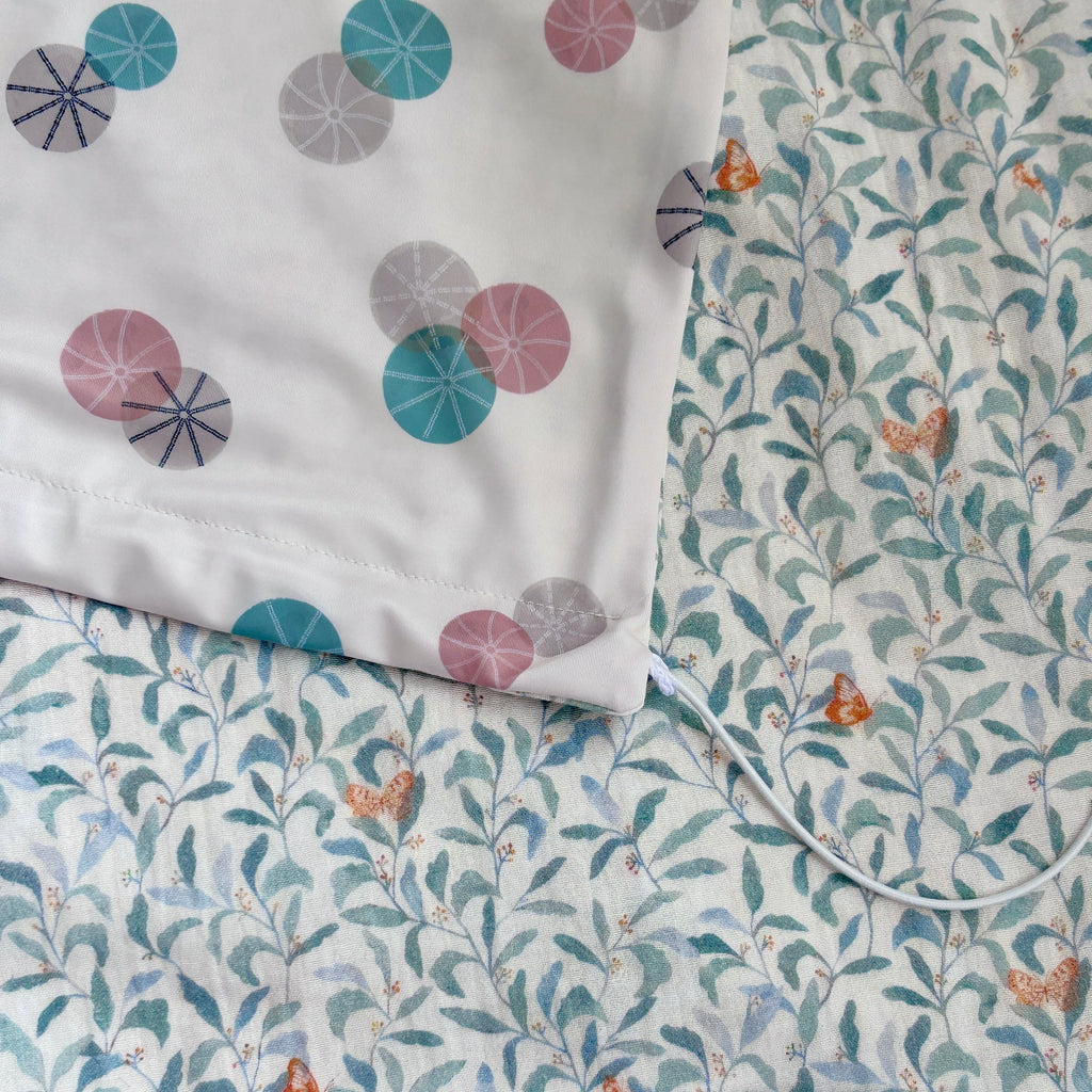 pare-soleil universel poussette dos route