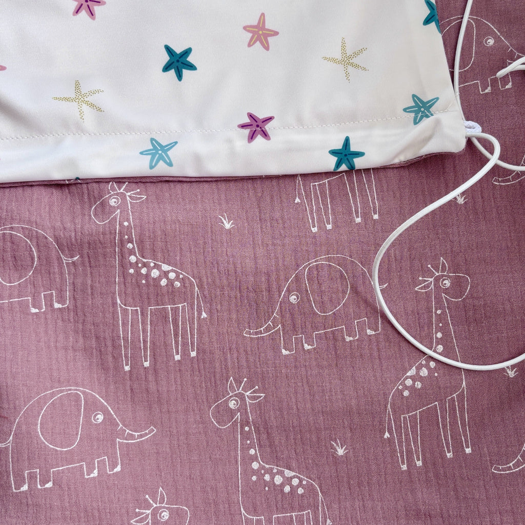 bébé en poussette protégé du soleil avec pare-soleil respirant