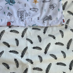 bébé en poussette protégé du soleil